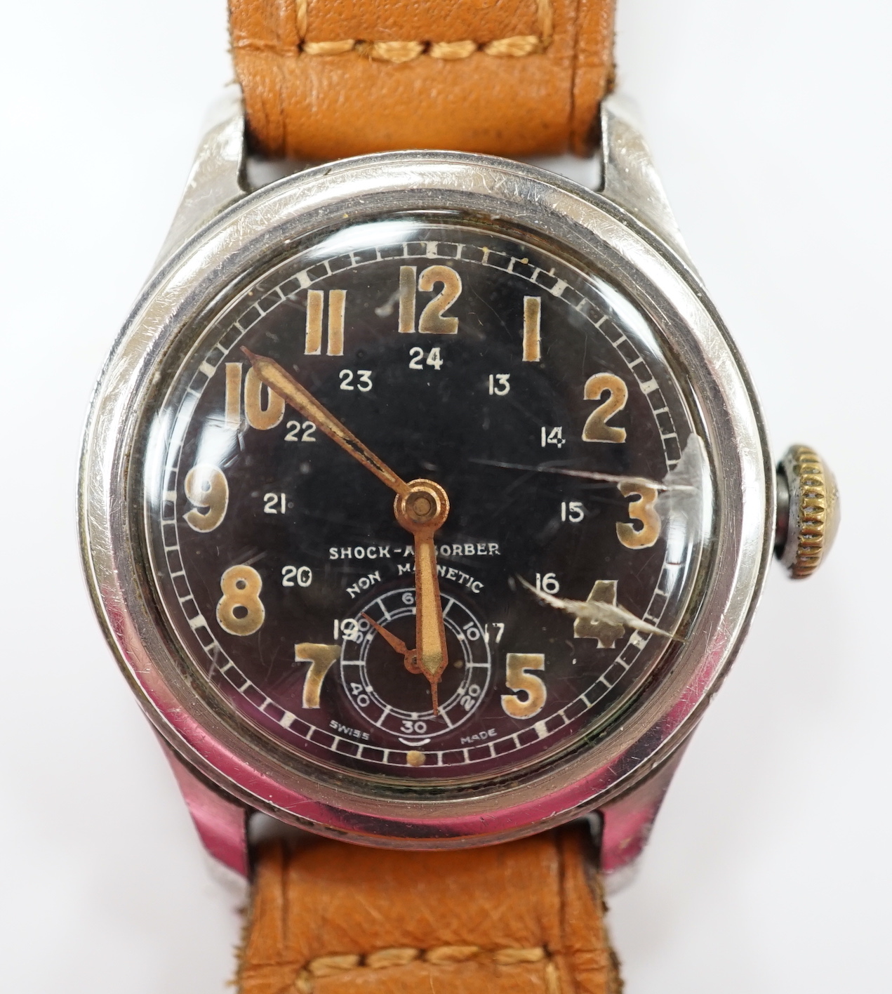 A gentleman's 1940's/1950's stainless steel manual wind wrist watch, with black Arabic dial and subsidiary seconds, on later associated leather strap.